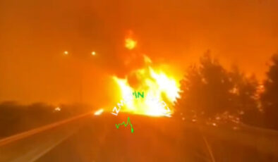 İzmir’de bir sürücü otoyola sıçrayan alevlerin arasından geçti