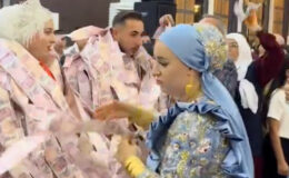 Mardin’de düğünde damada 200 TL’lik banknotlarla yelek giydirildi