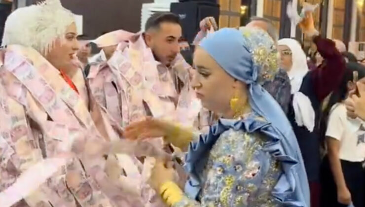 Mardin’de düğünde damada 200 TL’lik banknotlarla yelek giydirildi