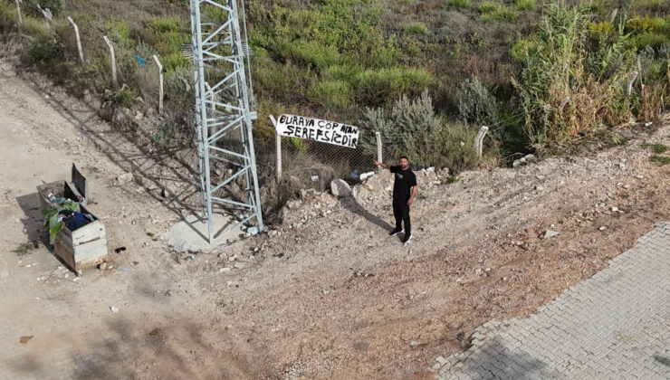 Hatay’da evinin yakınına çöp atanlara çözümü “Buraya çöp atan şerefsizdir” yazısında buldu